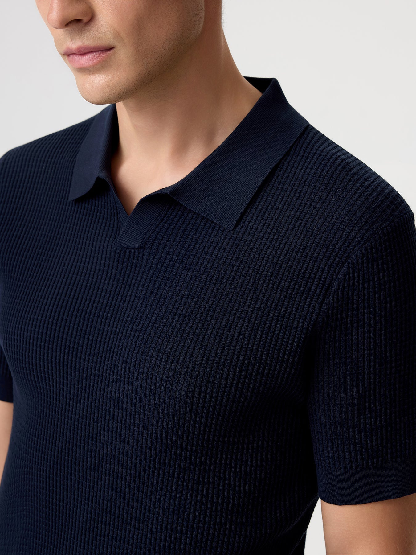 FlexKnit Active Knitted Buttonless Polo